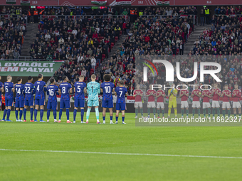 Team Hungary and Team Netherlands stand before the UEFA Nations League Group match at Puskas Arena in Budapest, Hungary, on October 11, 2024...