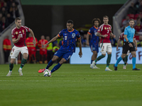 Ryan Gravenberch of the Netherlands competes for the ball with Barnabas Varga of Hungary during the UEFA Nations League Group match at Puska...