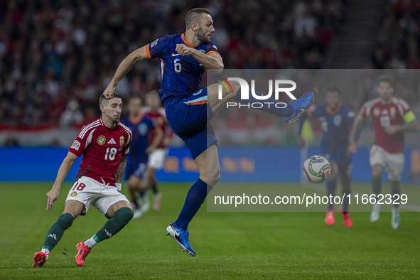 Stefan De Vrij of the Netherlands competes for the ball with Zsolt Nagy of Hungary during the UEFA Nations League Group match at Puskas Aren...