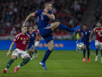 Stefan De Vrij of the Netherlands competes for the ball with Zsolt Nagy of Hungary during the UEFA Nations League Group match at Puskas Aren...