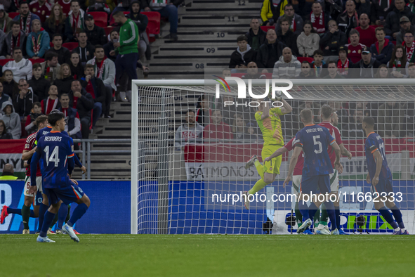 Goalkeeper of Hungary, Denes Dibusz, saves during the UEFA Nations League Group match at Puskas Arena in Budapest, Hungary, on October 11, 2...