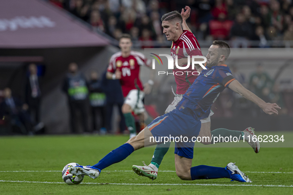 Roland Sallai of Hungary competes for the ball with Stefan De Vrij of the Netherlands during the UEFA Nations League Group match at Puskas A...