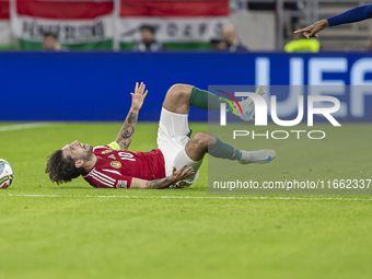 Dominik Szoboszlai of Hungary competes for the ball with Denzel Dumfries of the Netherlands during the UEFA Nations League Group match at Pu...