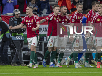 Roland Sallai of Hungary and his teammates celebrate the first goal during the UEFA Nations League Group match at Puskas Arena in Budapest,...