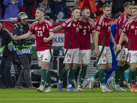 Roland Sallai of Hungary and his teammates celebrate the first goal during the UEFA Nations League Group match at Puskas Arena in Budapest,...