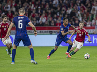 Ryan Gravenberch of the Netherlands competes for the ball with Barnabas Varga of Hungary during the UEFA Nations League Group match at Puska...