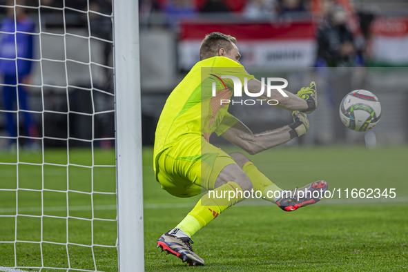 Goalkeeper of Hungary, Denes Dibusz, saves during the UEFA Nations League Group match at Puskas Arena in Budapest, Hungary, on October 11, 2...