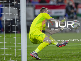 Goalkeeper of Hungary, Denes Dibusz, saves during the UEFA Nations League Group match at Puskas Arena in Budapest, Hungary, on October 11, 2...