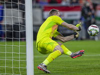 Goalkeeper of Hungary, Denes Dibusz, saves during the UEFA Nations League Group match at Puskas Arena in Budapest, Hungary, on October 11, 2...