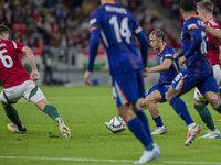 Xavi Simons of the Netherlands participates in the UEFA Nations League Group match at Puskas Arena in Budapest, Hungary, on October 11, 2024...