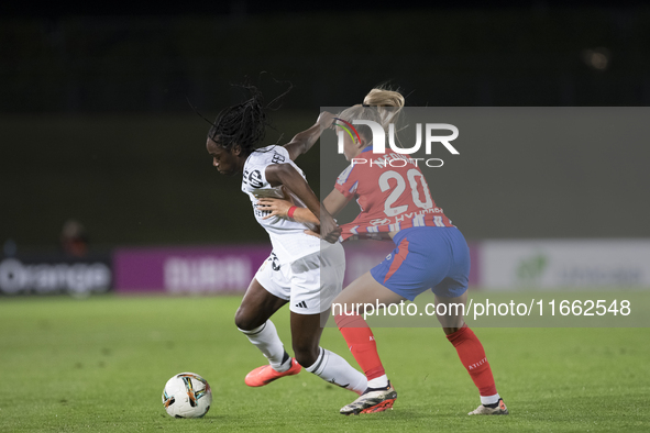 Naomie Feller of Real Madrid women and Andrea Medina of Atletico de Madrid women fight for the ball during the LIGA F match between Real Mad...