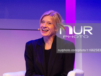 Caroline Peters, a German actress, is seen on the stage of Flora Hall in Cologne, Germany, on October 13, 2024, during the Lit.Cologne 2024...