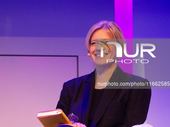 Caroline Peters, a German actress, is seen on the stage of Flora Hall in Cologne, Germany, on October 13, 2024, during the Lit.Cologne 2024...