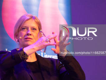 Caroline Peters, a German actress, is seen on the stage of Flora Hall in Cologne, Germany, on October 13, 2024, during the Lit.Cologne 2024...