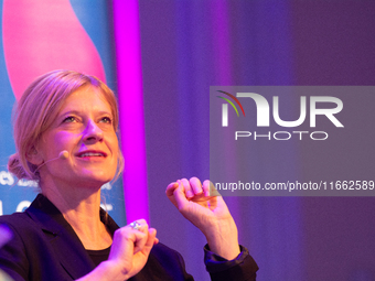 Caroline Peters, a German actress, is seen on the stage of Flora Hall in Cologne, Germany, on October 13, 2024, during the Lit.Cologne 2024...