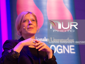 Caroline Peters, a German actress, is seen on the stage of Flora Hall in Cologne, Germany, on October 13, 2024, during the Lit.Cologne 2024...