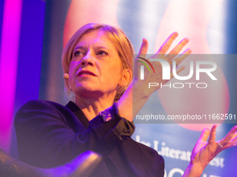 Caroline Peters, a German actress, is seen on the stage of Flora Hall in Cologne, Germany, on October 13, 2024, during the Lit.Cologne 2024...