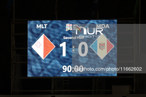 The match venue scoreboard displays the full-time result during the UEFA Nations League, League D, Group D2 soccer match between Malta and M...