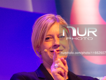 Caroline Peters, a German actress, is seen on the stage of Flora Hall in Cologne, Germany, on October 13, 2024, during the Lit.Cologne 2024...