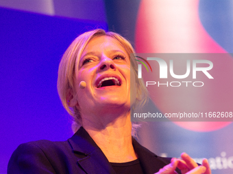 Caroline Peters, a German actress, is seen on the stage of Flora Hall in Cologne, Germany, on October 13, 2024, during the Lit.Cologne 2024...