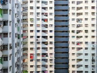 Residents of a high-rise residential building appear in Kolkata, India, on October 11, 2024. (