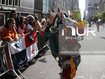 A general view of the Hispanic Heritage Parade takes place on Fifth Avenue in Manhattan, New York, United States, on October 13, 2024. Hispa...