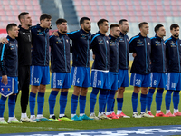 Soccer players from Moldova stand during the playing of their country’s national anthem prior to the UEFA Nations League, League D, Group D2...