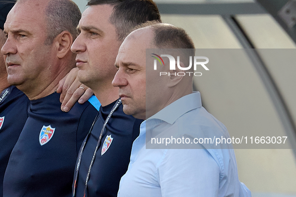 Serghei Cleşcenco, head coach of Moldova, stands at the front during the playing of their country’s national anthem before the UEFA Nations...