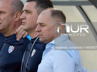 Serghei Cleşcenco, head coach of Moldova, stands at the front during the playing of their country’s national anthem before the UEFA Nations...