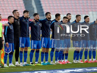 Soccer players from Moldova stand during the playing of their country’s national anthem prior to the UEFA Nations League, League D, Group D2...