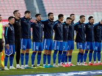 Soccer players from Moldova stand during the playing of their country’s national anthem prior to the UEFA Nations League, League D, Group D2...