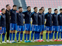 Soccer players from Moldova stand during the playing of their country’s national anthem prior to the UEFA Nations League, League D, Group D2...