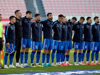 Soccer players from Moldova stand during the playing of their country’s national anthem prior to the UEFA Nations League, League D, Group D2...