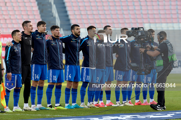 Soccer players from Moldova stand during the playing of their country’s national anthem prior to the UEFA Nations League, League D, Group D2...