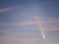 The comet Tsuchinshan-ATLAS (C/2023 A3) is seen over Torre Squillace, near Lecce, Italy, on October 13, 2024. The comet's coma, or head, mea...