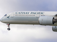 Cathay Pacific Airbus A350-900 passenger aircraft spotted flying over the houses in Myrtle Avenue before landing at London Heathrow Airport...