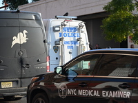 Authorities investigate the scene where a police officer dies by suicide in the Sunset Park section of Brooklyn, New York, United States, on...