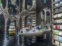 Visitors read books at Zhongshuge Bookstore in Chengdu, China, on October 13, 2024. (