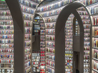 Visitors read books at Zhongshuge Bookstore in Chengdu, China, on October 13, 2024. (