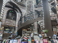 Visitors read books at Zhongshuge Bookstore in Chengdu, China, on October 13, 2024. (