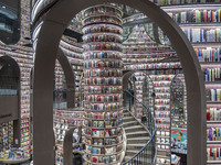 Visitors read books at Zhongshuge Bookstore in Chengdu, China, on October 13, 2024. (