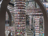 Visitors read books at Zhongshuge Bookstore in Chengdu, China, on October 13, 2024. (