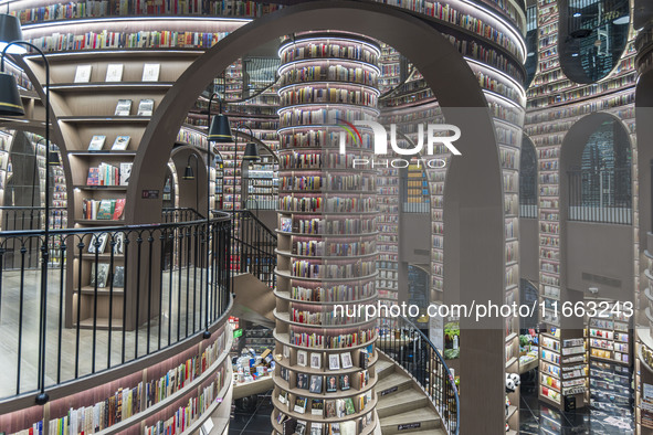 Visitors read books at Zhongshuge Bookstore in Chengdu, China, on October 13, 2024. 