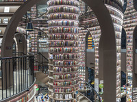 Visitors read books at Zhongshuge Bookstore in Chengdu, China, on October 13, 2024. (