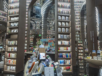 Visitors read books at Zhongshuge Bookstore in Chengdu, China, on October 13, 2024. (