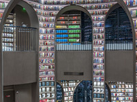 Visitors read books at Zhongshuge Bookstore in Chengdu, China, on October 13, 2024. (