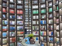 Visitors read books at Zhongshuge Bookstore in Chengdu, China, on October 13, 2024. (