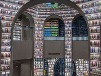 Visitors read books at Zhongshuge Bookstore in Chengdu, China, on October 13, 2024. (