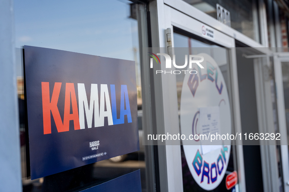 A sign for Kamala Harris is on a window in Philadelphia, Pennsylvania, United States, on October 13, 2024. 