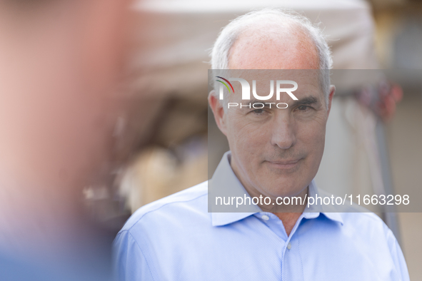 Sen. Bob Casey (D-PA) stands outside a campaign rally in Philadelphia, Pennsylvania, United States, on October 13, 2024. 